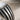 Fluted Cushion Signet Ring, oxidized silver, angled close-up of fluted shoulder