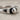 Pebble Bar Stacking Ring, oxidized silver, close-up view of the pebble and bar