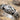 Fede Rosemary Friendship Ring, oxidized finish, close-up of clasped hands relief