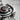 Mourning Garnet Buckle Pendant, oxidized silver, close-up of center garnet