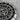 Aztec Sun Stone Relief Pendant, oxidized silver, close-up of central face relief