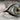 Evil Eye Silver Fold Ring, oxidized finish, close-up showing amber iris artwork
