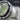 Prehnite Rounded Crater Ring, oxidized silver, close-up of cabochon stone