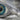 Evil Eye Aurora Halo Ring, oxidized silver, close-up of the iris and cubic zirconia halo