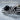 Onyx Knot Tie Clip Accessory, oxidized silver, angled close-up view