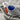Perched Kingfisher Hat Pin Accessory, oxidized silver, close-up of enamel wings