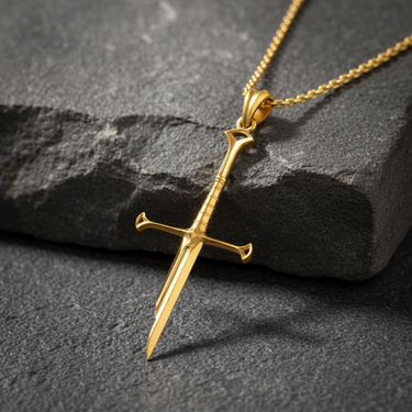 Angled view of gold plated fantasy sword necklace highlighting craftsmanship and polished surface