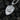 St. George Shield Pendant, polished silver, angled view on charcoal
