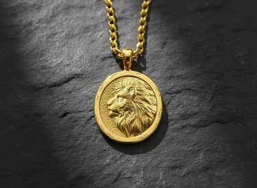 Detailed 925 sterling silver lion pendant featuring a profile relief against a textured background on stone