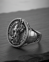 Side profile of silver St George ring showing crusader shield and faith and courage banner detail