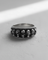 Oxidized 925 sterling silver skull band ring with three wise monkeys motif covering eyes ears and mouth