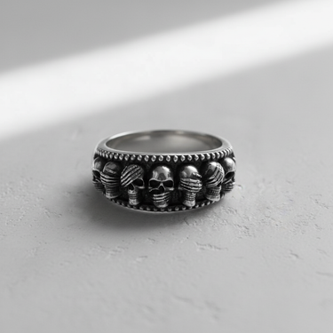 Oxidized 925 sterling silver skull band ring with three wise monkeys motif covering eyes ears and mouth