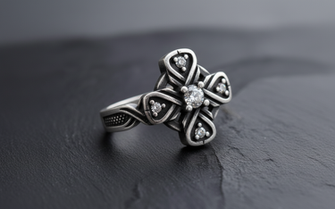 Side view of 925 sterling silver Celtic ring showing oxidized finish and textured band details