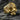 Gold vermeil silver skull ring with white pave stones and artistic swirl engraving on forehead