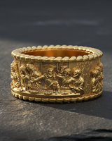 Close-up of intricate relief work on Last Supper band ring featuring the Twelve Apostles design
