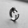 Side profile of handcrafted 925 sterling silver pug ring showing textured fur and wrap design on grey background
