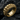 Thick eternity skull ring with intricate rope details resting on textured dark stone emphasizing premium craftsmanship