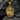 Close-up of Saint Gabriel archangel pendant resting on dark stone showcasing intricate craftsmanship