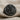 Saint Mark Signet Ring, black rhodium, front view on linen fabric