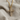 Pave Cross Pendant, gold vermeil, product photo on woven linen fabric