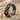 Wood Branch Ring, black rhodium, product view resting upright in sand