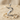 Swan Letter Z Pendant, polished silver, angled view on sand