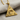 Celestial All-Seeing Eye Pendant, gold vermeil, angled view on fabric