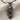 Butterfly Maiden Pendant, black rhodium, product photo on linen