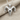 Curved Horn Ram Skull Pendant, polished silver, front view