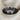 Twisted Eternity Ring, black rhodium, front view on fabric