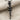 Assault Rifle Pendant, black rhodium, front view on fabric