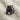 Growling Tiger Ring, black rhodium, three-quarter view on textured fabric