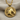 Horse Medallion Pendant, gold vermeil, front view on fabric