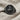 Orixa Oxossi Ring, black rhodium plated, front view on linen