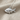 Lucky Fish Pendant in polished silver on fabric