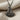 Hammered Sailboat Pendant, black rhodium plated, product photo on linen
