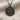 Wave Swimmer Pendant, black rhodium plated, view on fabric