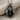 Heart Padlock Pendant, black rhodium, front view on linen fabric