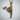 Close-up of rhythmic gymnast pendant showing intricate athletic pose details on a textured surface