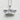 Cherub Angel Pendant, polished silver, front view on textured wall