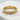 Woven Braid Ring, gold vermeil, front view on stone surface