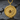 Dramatic vertical shot of dark fantasy dragon pentagram pendant with tiger eye on a textured stone background.