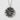 Japanese peace kanji pendant, oxidized silver finish on white textured surface