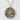 Close-up of the Japanese Hikari kanji light pendant showing the hammered silver texture and shiny gold brushstrokes.