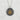 Handcrafted eternity kanji pendant in oxidized silver and gold resting flat on a textured white stone surface background