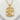 Close-up front view of the Japanese love pendant resting on a white stone showcasing intricate metalwork and bail.