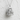Himeji Castle Pendant, polished, angled product photo on textured wall