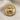 Close-up of the ancient Anatolian deer standard lapel pin secured elegantly on textured linen fabric background