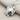 Ocean Sea Turtle Pendant, polished silver, angled product photo on fabric