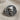 Jester Skull Ring, oxidized silver, top-down product view on fabric